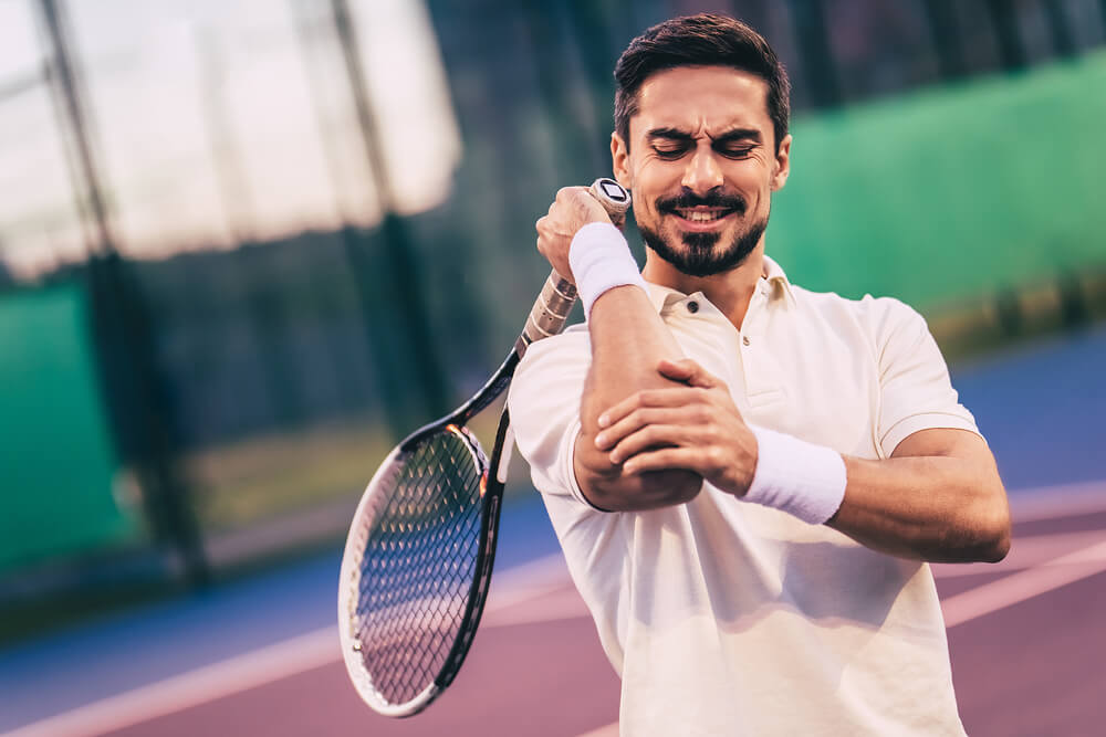 What causes elbow pain when bending and straightening my arm?