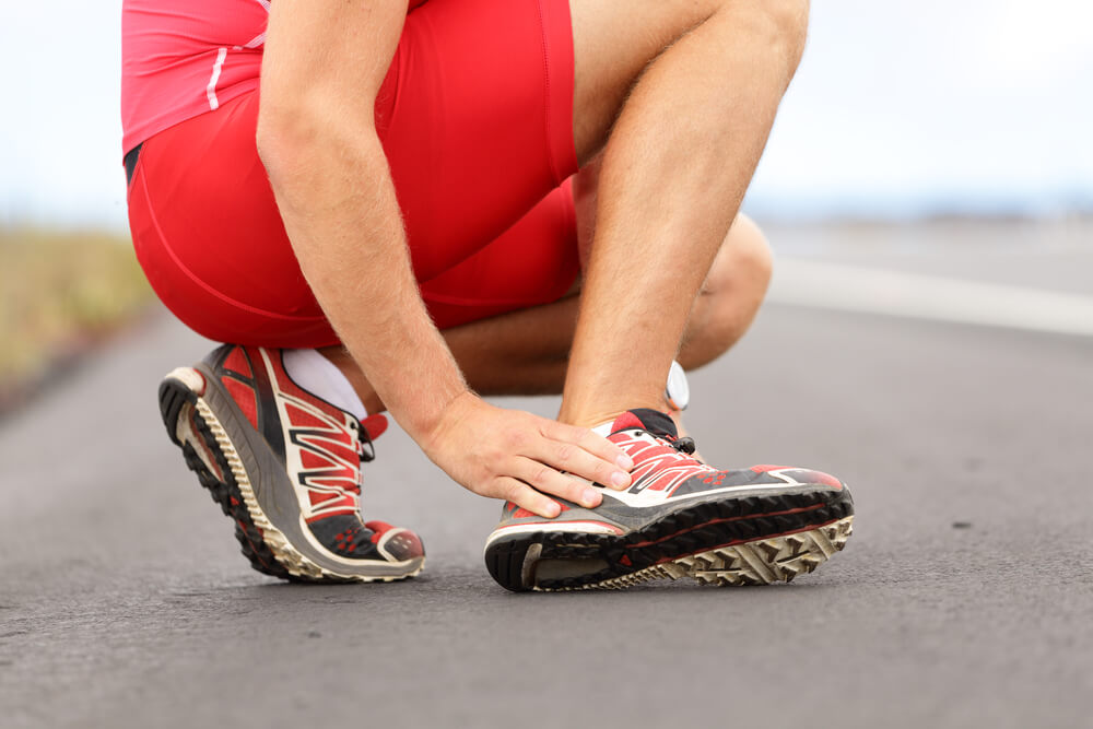 Why do I have a stabbing pain in the side of my foot?
