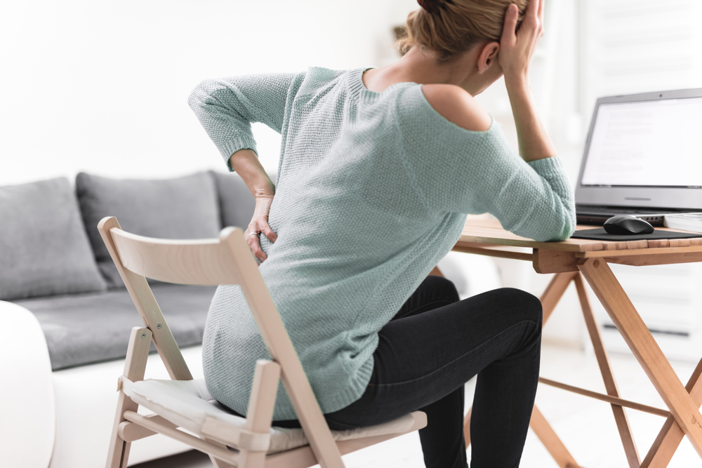 Four ways you could develop latissimus dorsi muscle pain at work shutterstock 1673982841 Four ways you could develop latissimus dorsi muscle pain at work