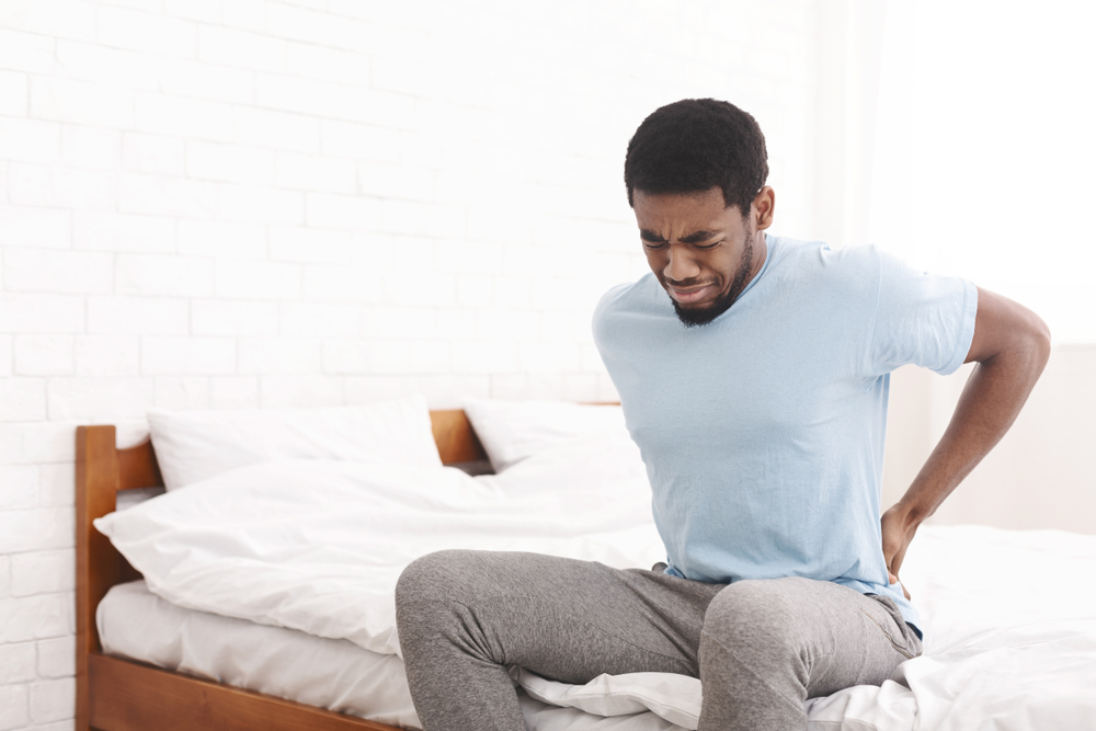 3 possible reasons why my back hurts when I lay down shutterstock 1329349922 3 possible reasons why my back hurts when I lay down