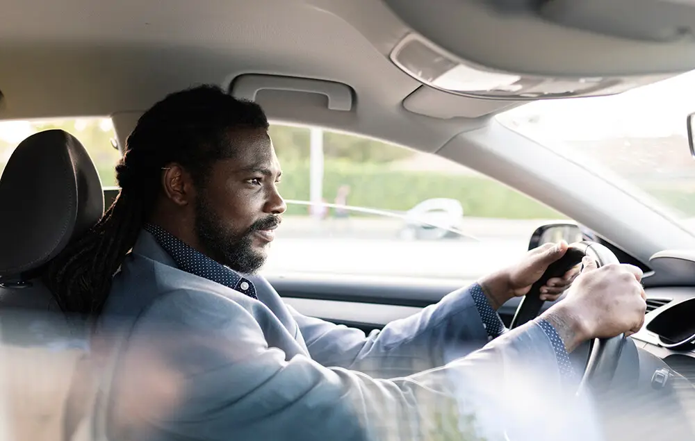 What to do if you constantly feel knee pain from driving hispanic latino businessman driving concentrated 2022 02 02 20 12 07 utc What to do if you constantly feel knee pain from driving
