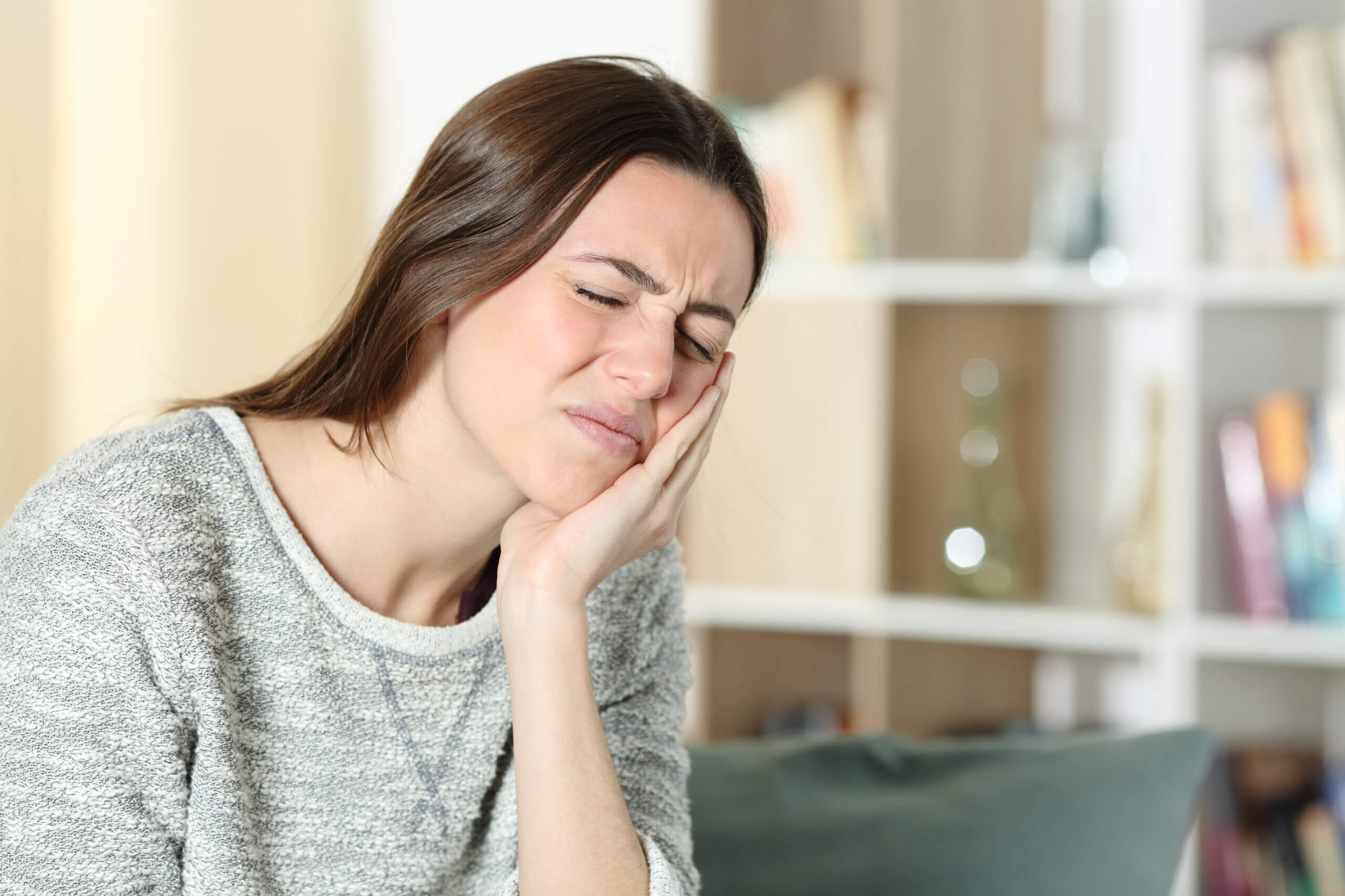 6 TMJ dysfunction symptoms you may be feeling in your ear shutterstock 1935751597 1 scaled 1 6 TMJ dysfunction symptoms you may be feeling in your ear