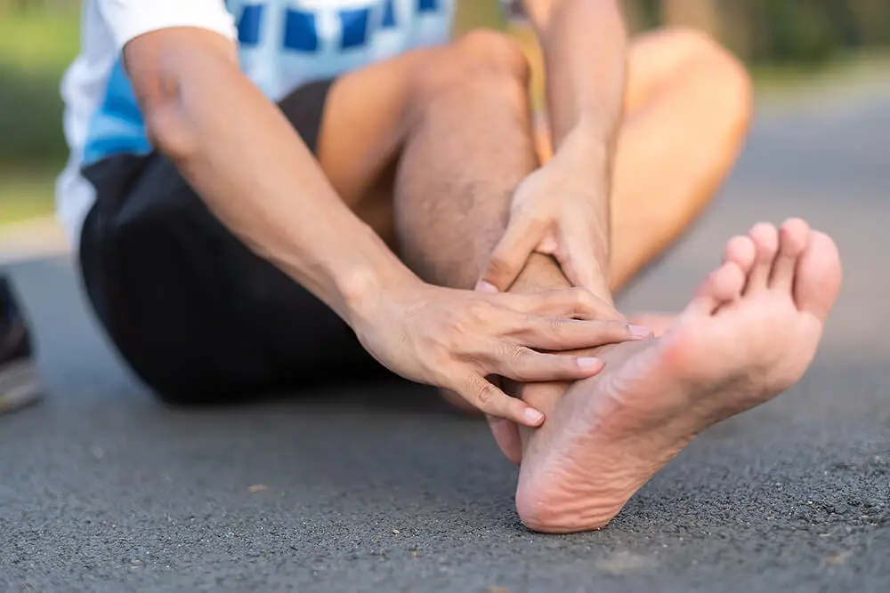 3 PT treatments for a sprained ankle that's also causing knee pain young fitness man holding his sports leg injury 2023 11 27 05 11 29 utc 3 PT treatments for a sprained ankle that’s also causing knee pain